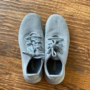 Gray Allbirds tennis shoes